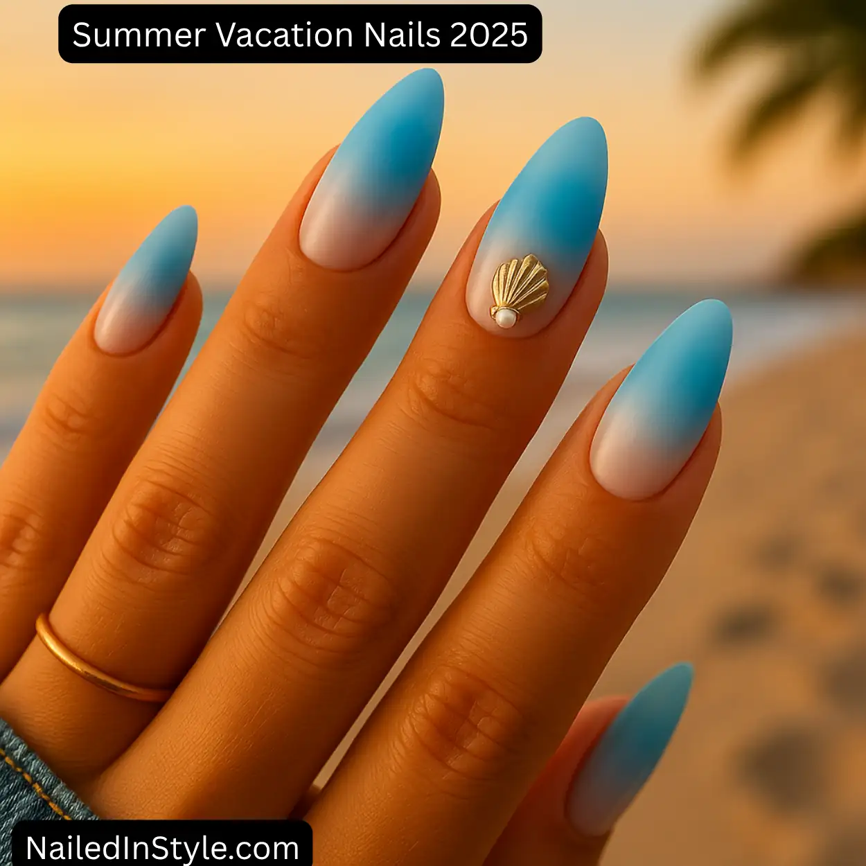 Close-up of a medium-toned hand with short almond nude-gel nails and a single seashell charm on the ring finger, held over sand and sea foam.