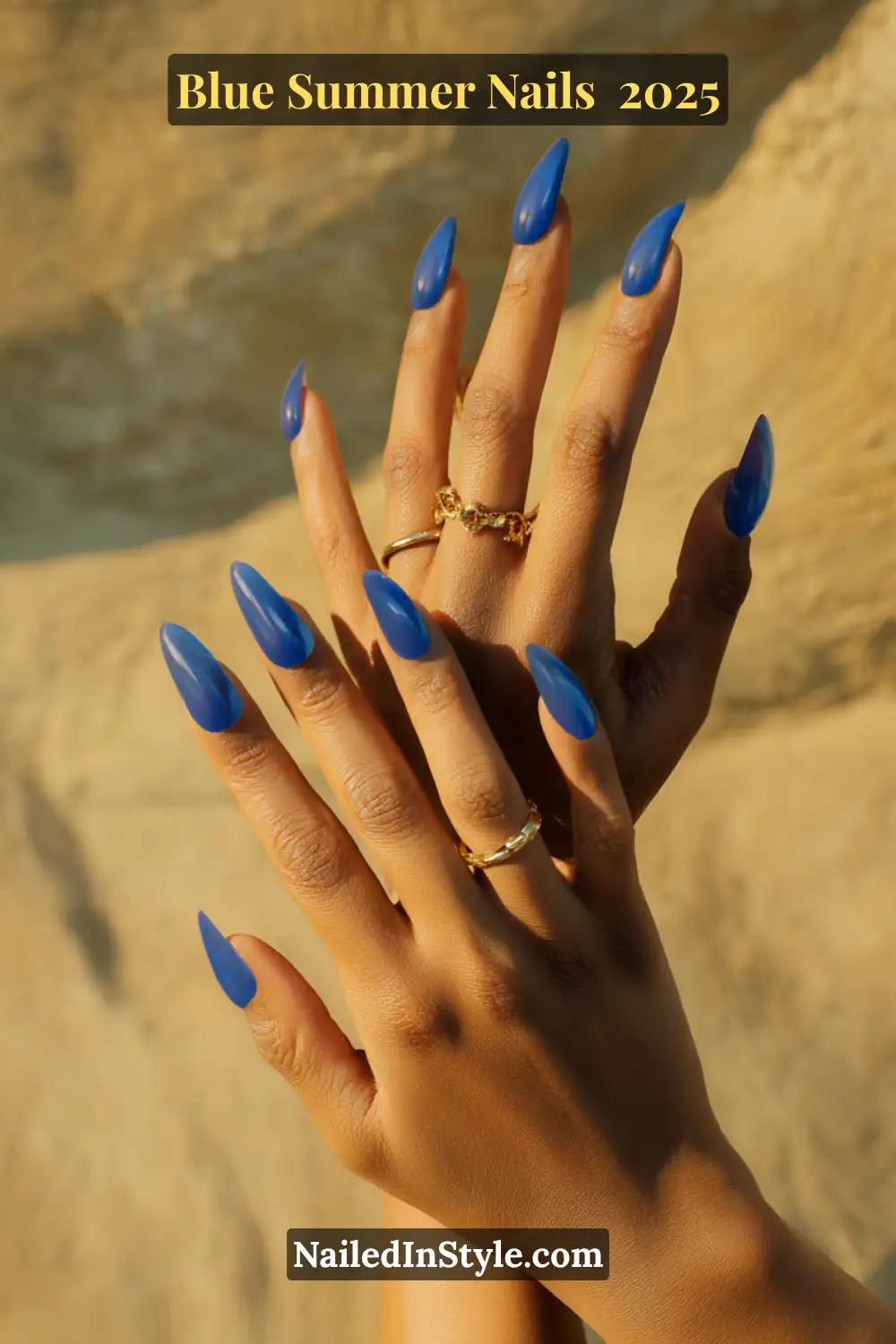 Blue Summer Nails 2025: Make a Splash with the Coolest Trends of the Season 9 Close-up of olive-toned hands with almond-shaped cobalt and electric blue nails, ideal for summer 2025.