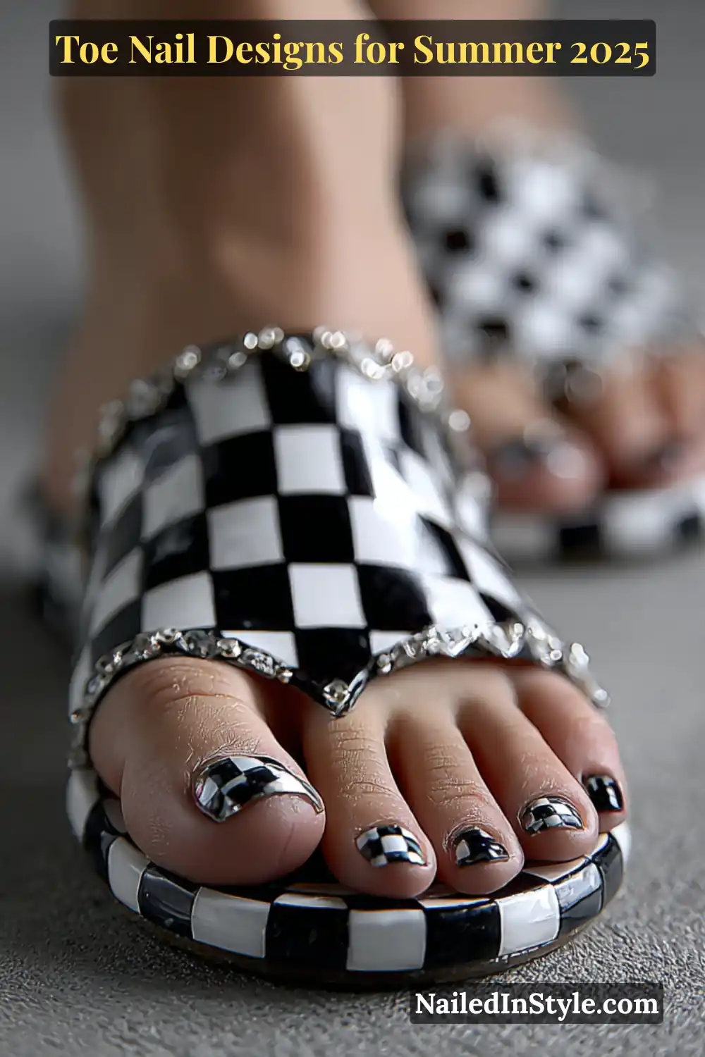 Toe Nail Designs for Summer 2026: Fresh Looks for Every Step 29 Close-up of female toes with glossy black and silver chrome checkerboard nail art, wearing matching checkered sandals