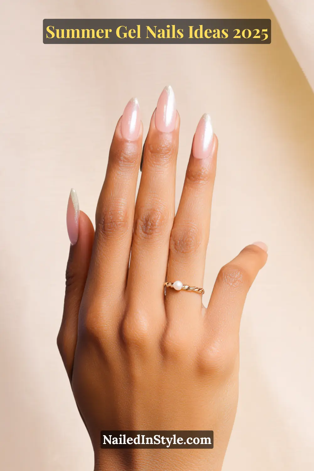 Summer Gel Nails Ideas 2026 14 Elegant hand featuring long almond-shaped gel nails with soft pink bases and mint green French tips, finished with a pearlescent shimmer.