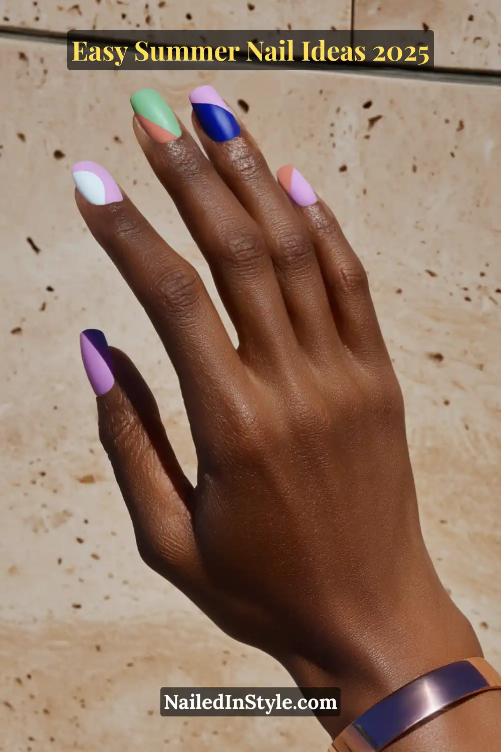 Easy Summer Nail Ideas 2026 That Look Gorgeous with Minimal Effort 6 Hand with short, square nails in bold color block patterns featuring negative space—lavender, green, coral, white, and cobalt blue geometric designs for summer 2025.