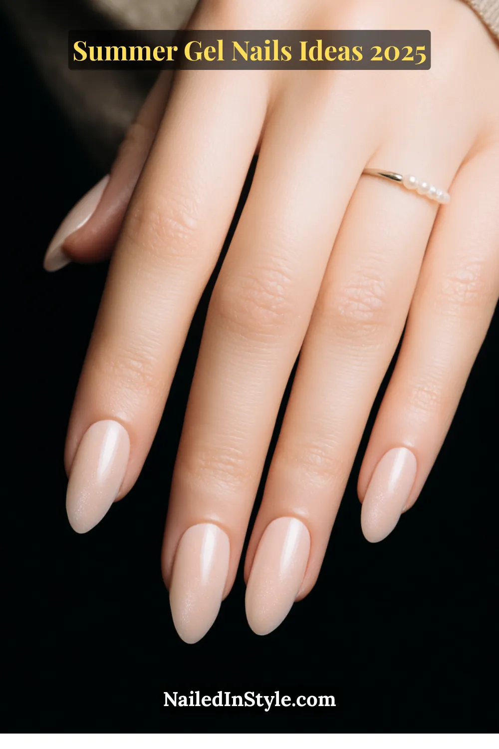 Summer Gel Nails Ideas 2026 21 Close-up of nude gel nails with a high-shine shimmer finish, soft almond shape.