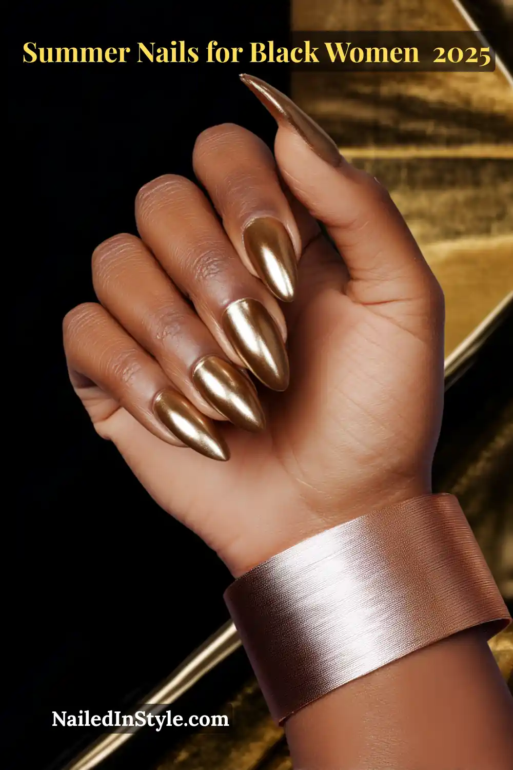 Close-up of Black woman's hand with reflective gold chrome almond nails, summer 2025 nail trend