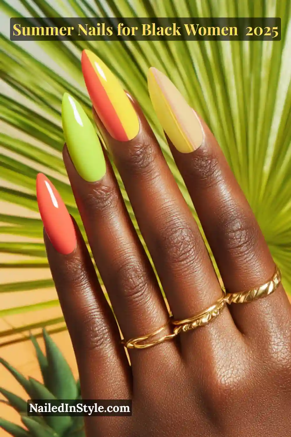 Close-up of a Black woman's hand with tropical summer nails in coral, lime green, and yellow against a palm leaf background.