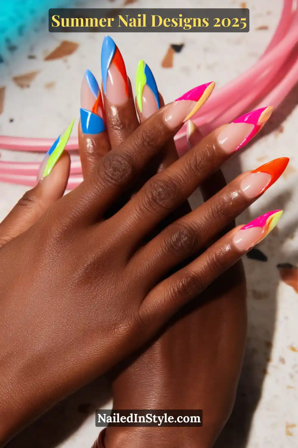Vibrant summer nail art featuring neon flame designs, rainbow tips, and color-block patterns on almond-shaped nails