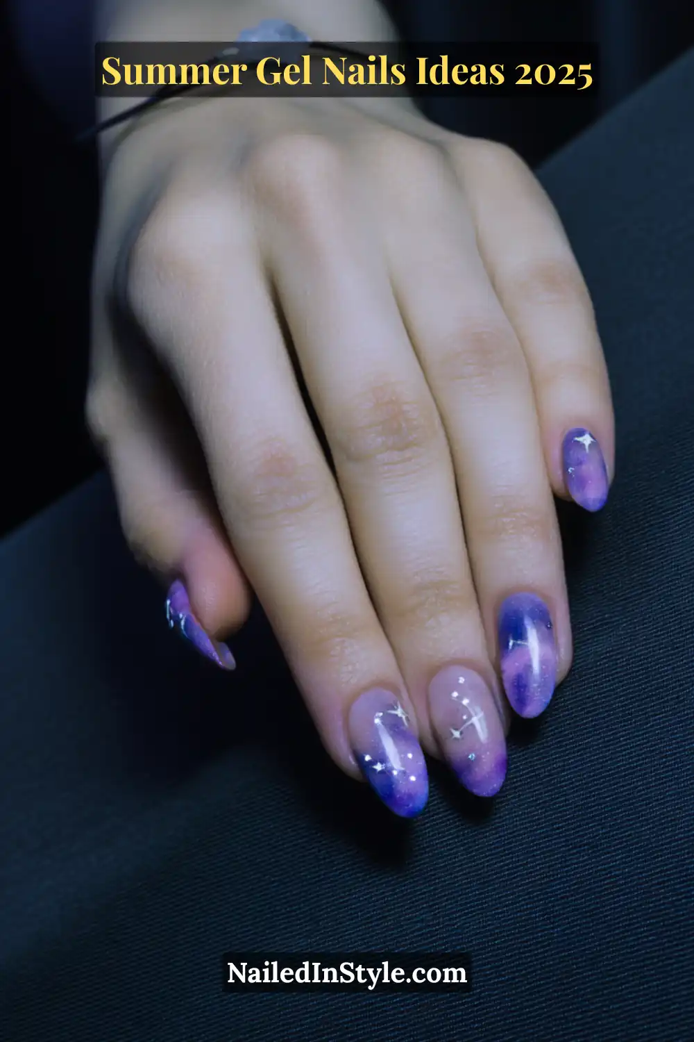 Summer Gel Nails Ideas 2026 18 Cosmic-themed gel nails in gradient purple and pink, featuring tiny white stars and dreamy aura glow effects.