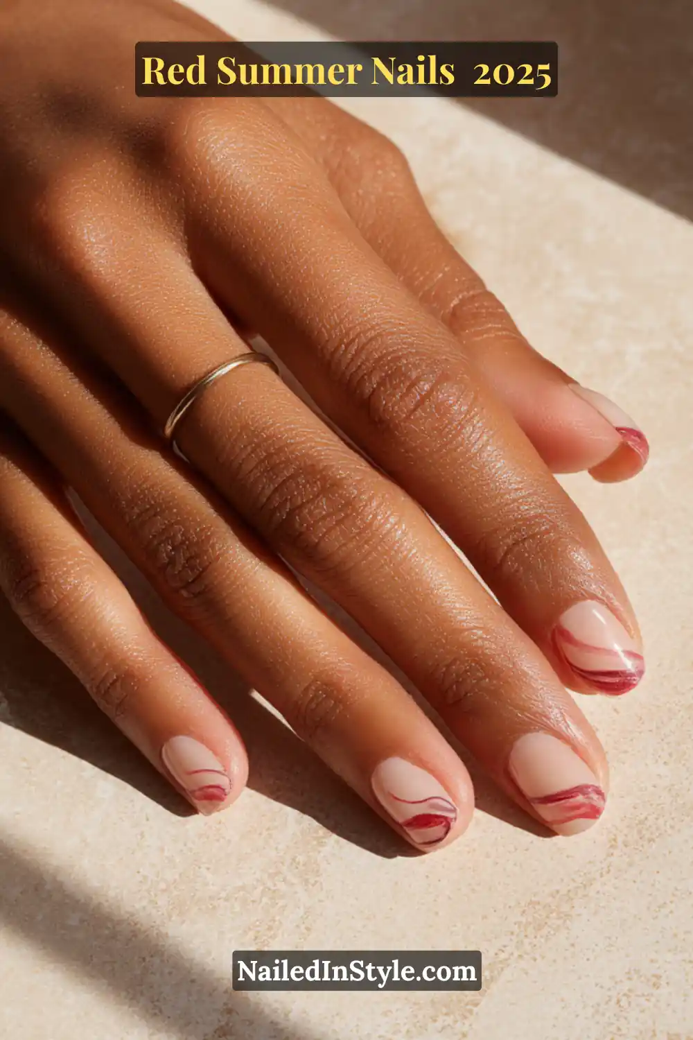 Red Summer Nails 2026: Bold, Fiery & Classic Warm-Weather Looks 20 Short nude nails with bold red swirl art design, styled for summer 2025