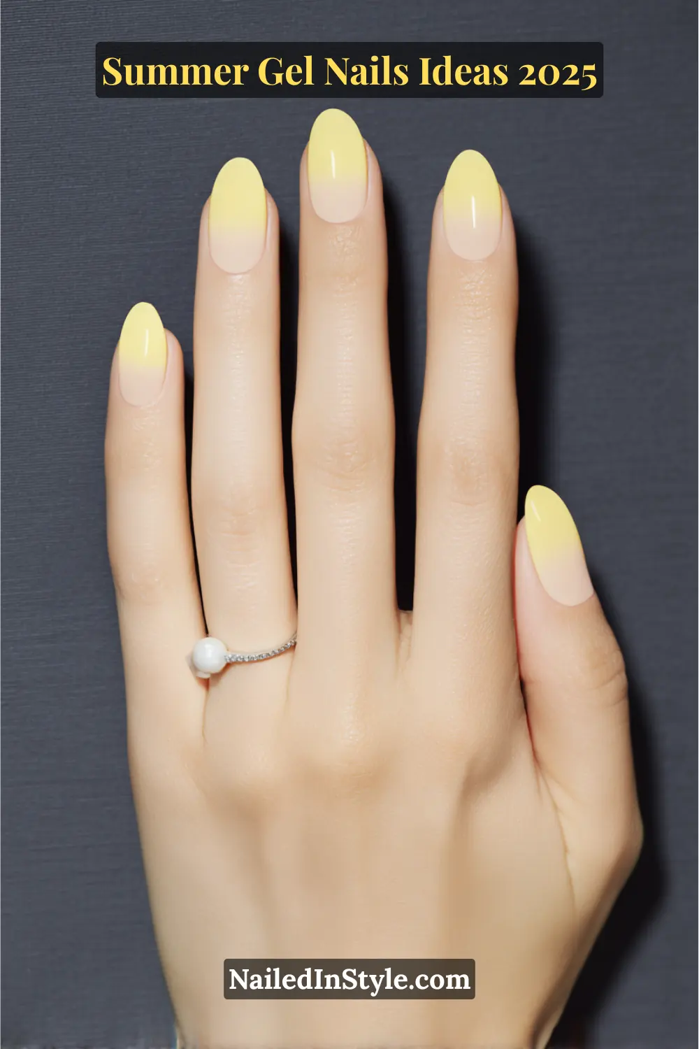 Summer Gel Nails Ideas 2026 12 Close-up of a hand with oval-shaped nails featuring a soft yellow ombré fade over a sheer base, finished with a high-gloss topcoat.
