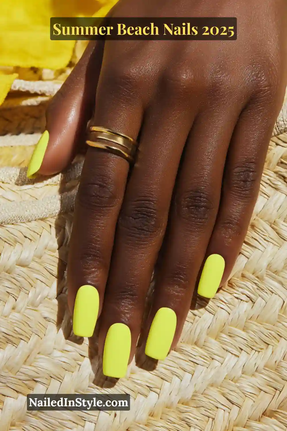 Summer Beach Nails 2026: Tropical, Trendy & Totally You 18 Close-up of short square neon yellow nails on a dark-skinned hand with gold ring, styled for summer beach fashion