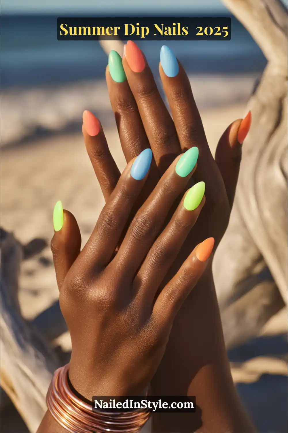 Bright aqua, lime green, coral, and orange dip nails on almond-shaped nails, set against a sunny beach backdrop.