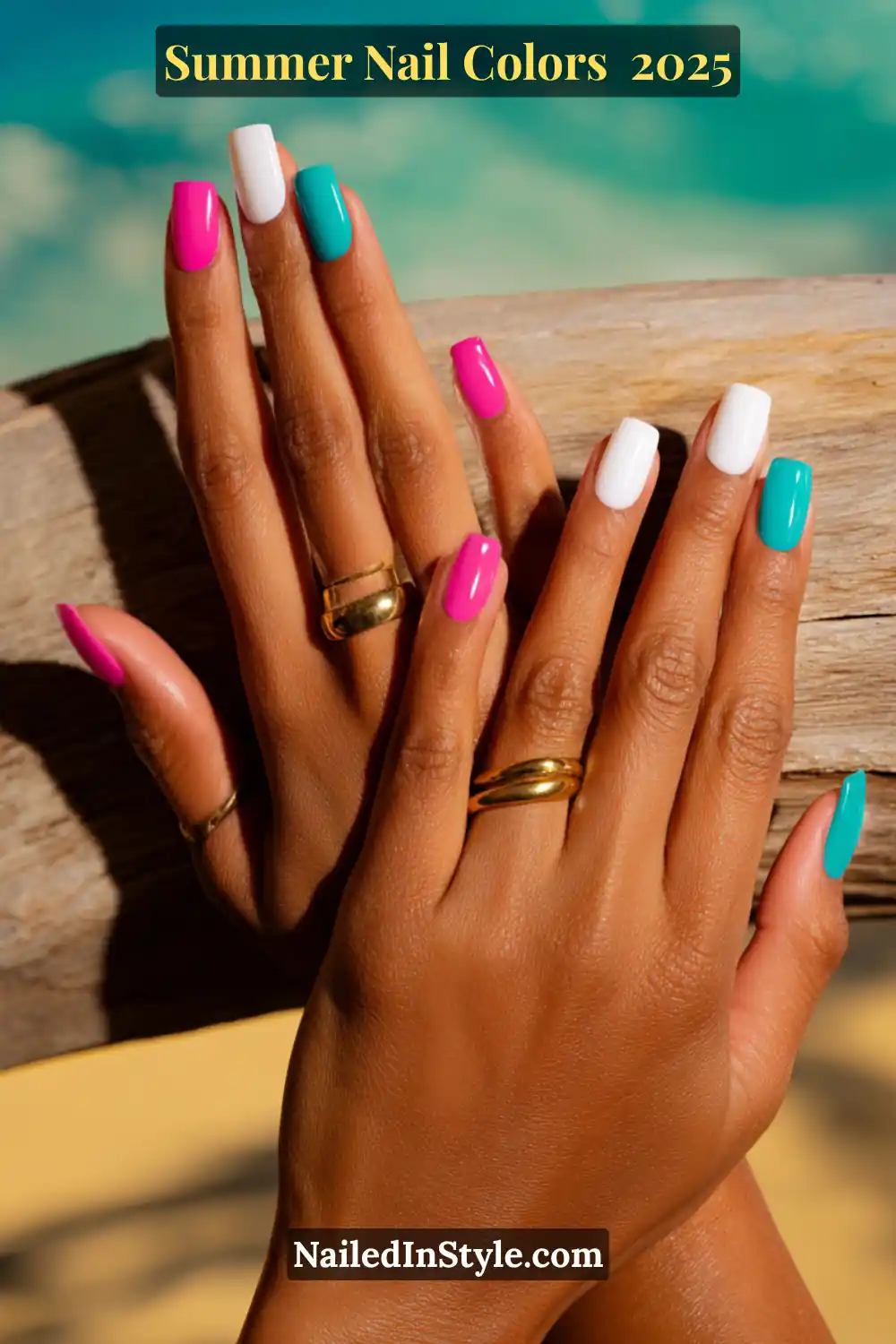 Hottest Summer Nail Colors 2026: Bold, Breezy & On-Trend 10 Two tan hands with nails painted in neon pink, teal, and crisp white polish against a beachy background.
