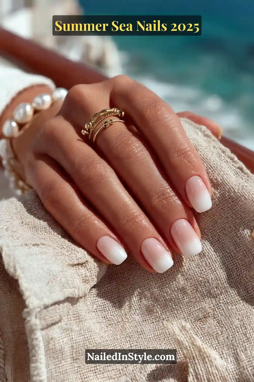 Milky white BIAB overlay on natural short square nails, glowing with soft ocean-inspired shimmer