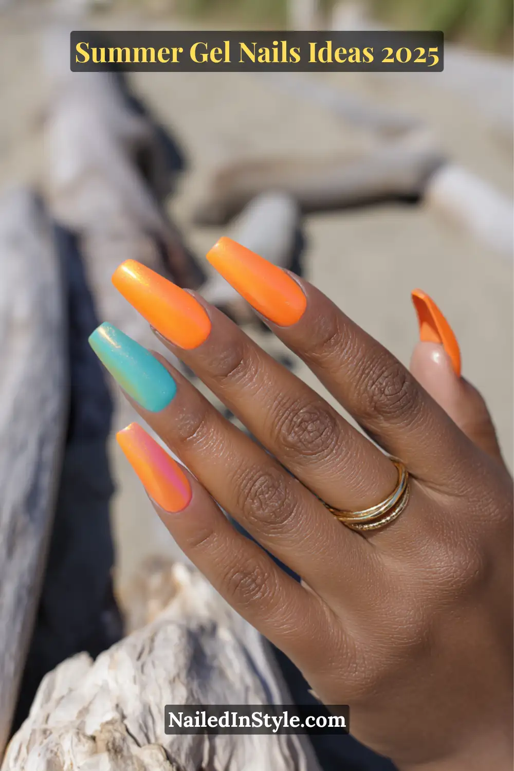 Summer Gel Nails Ideas 2026 8 A close-up of a woman with olive-toned skin showing off long square-shaped gel nails in a sunset-inspired color palette—mango chrome, turquoise shimmer, and vibrant marigold orange.