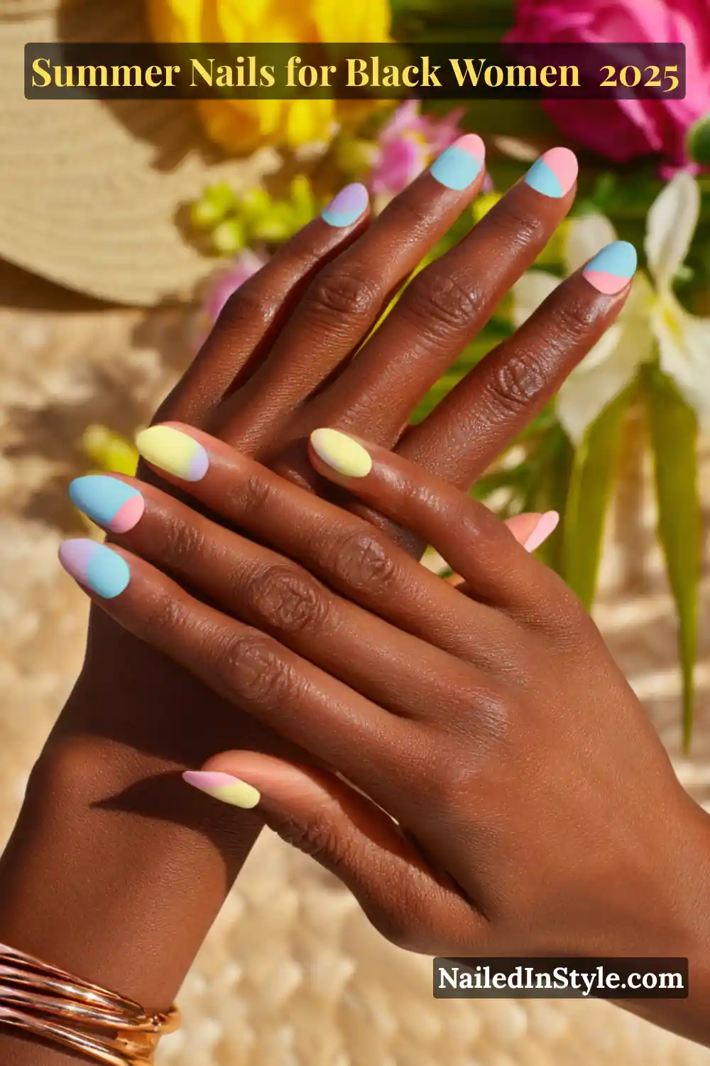 Close-up of Black woman’s hands with pastel tie-dye tips on natural nail beds, summer nail art 2025