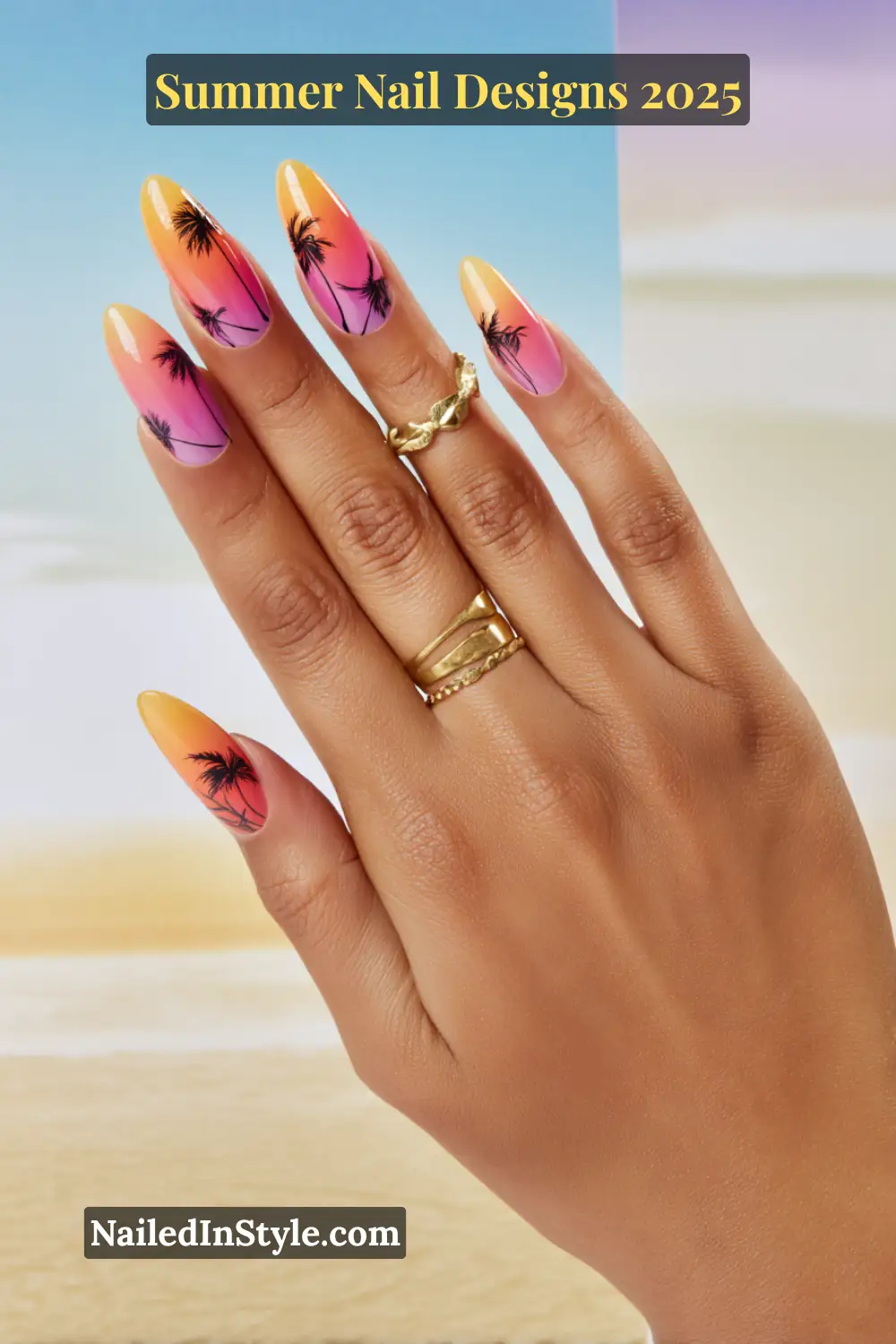 Hand with gradient sunset nail design featuring black palm tree silhouettes