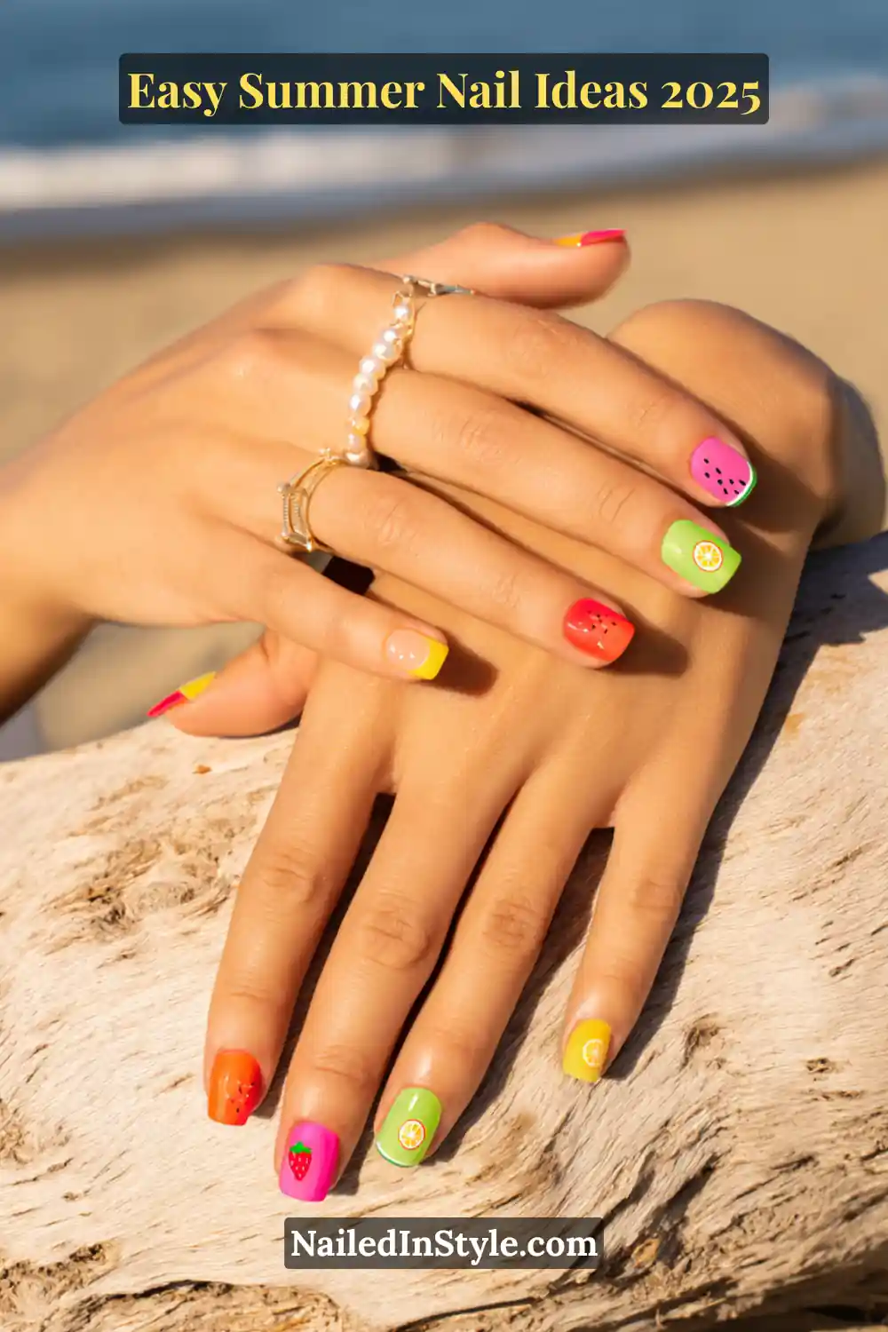 Easy Summer Nail Ideas 2026 That Look Gorgeous with Minimal Effort 5 Colorful summer gel nails with bold fruit-themed designs including watermelon, lemon, lime, strawberry, and kiwi accents on short square nails—playful 2025 beach manicure.
