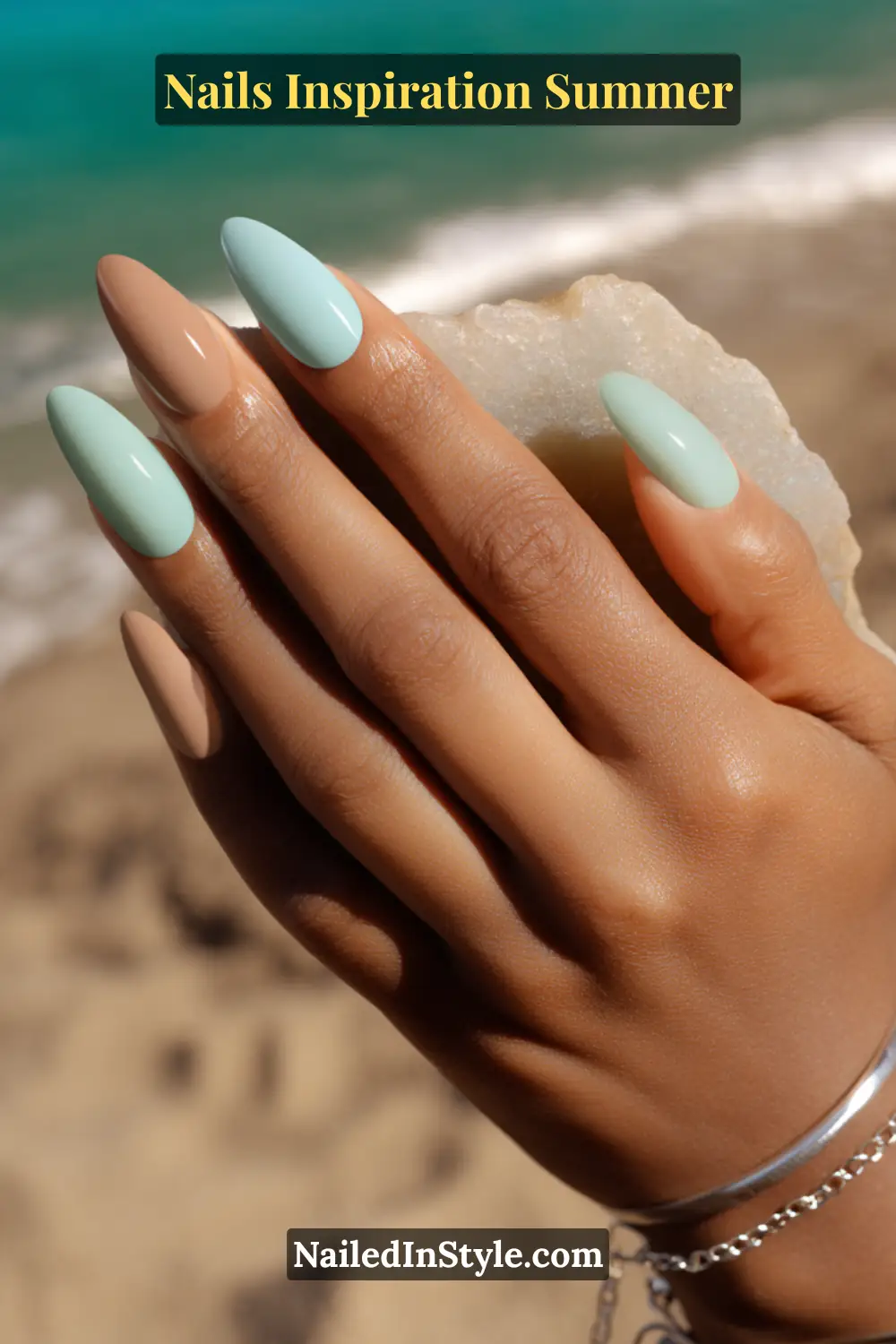 Nails Inspiration Summer 2025: Fresh Trends & Chic Ideas 10 Close-up of almond-shaped nails painted in alternating aqua blue and sandy beige tones with a glossy finish, complementing tan skin and sunlit summer beach vibes.