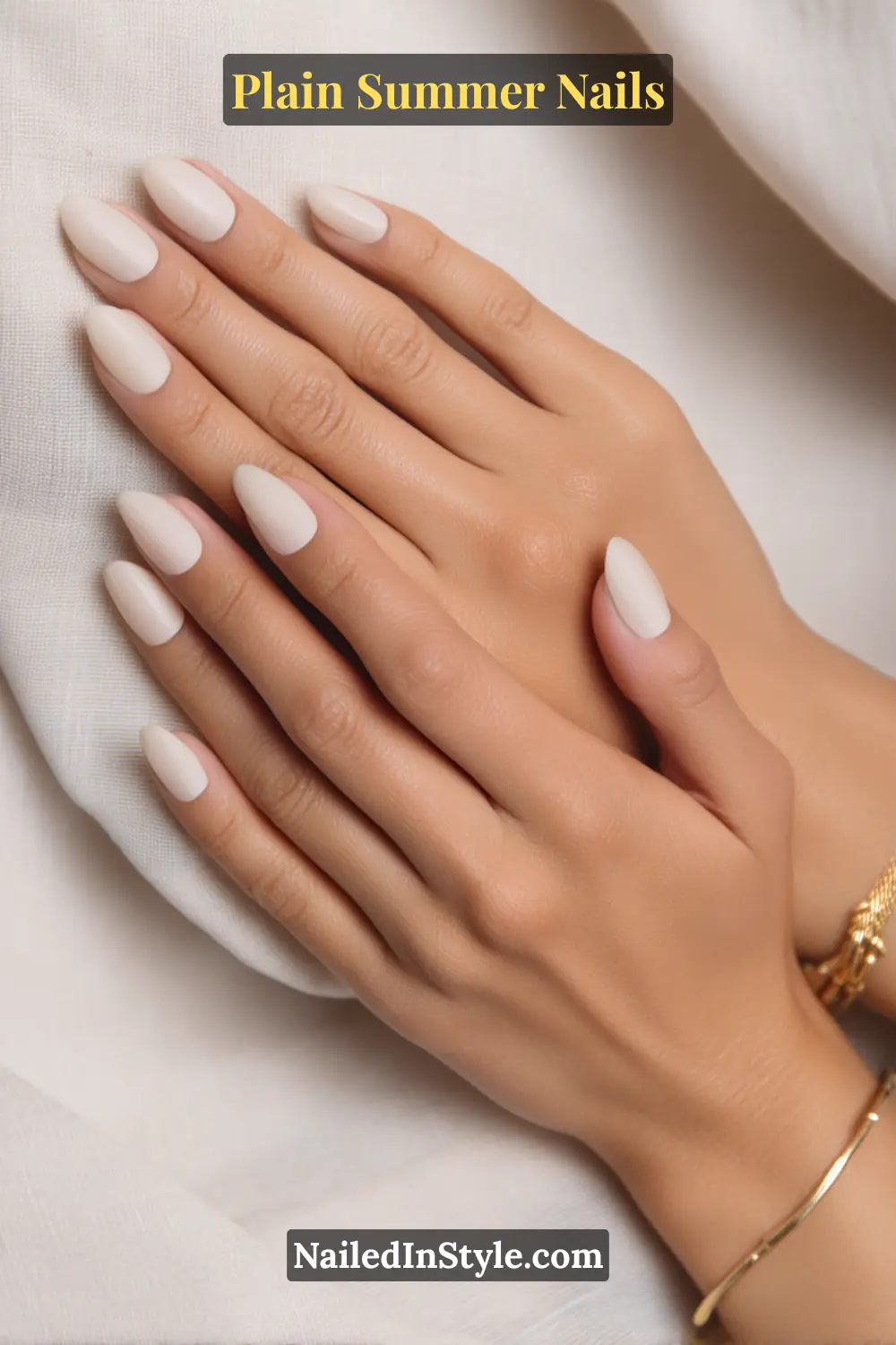 Plain Summer Nails 2025: Simple & Timeless Beauty 14 Hands with creamy ivory nude nails, showcasing a fresh, clean, and sophisticated summer manicure.