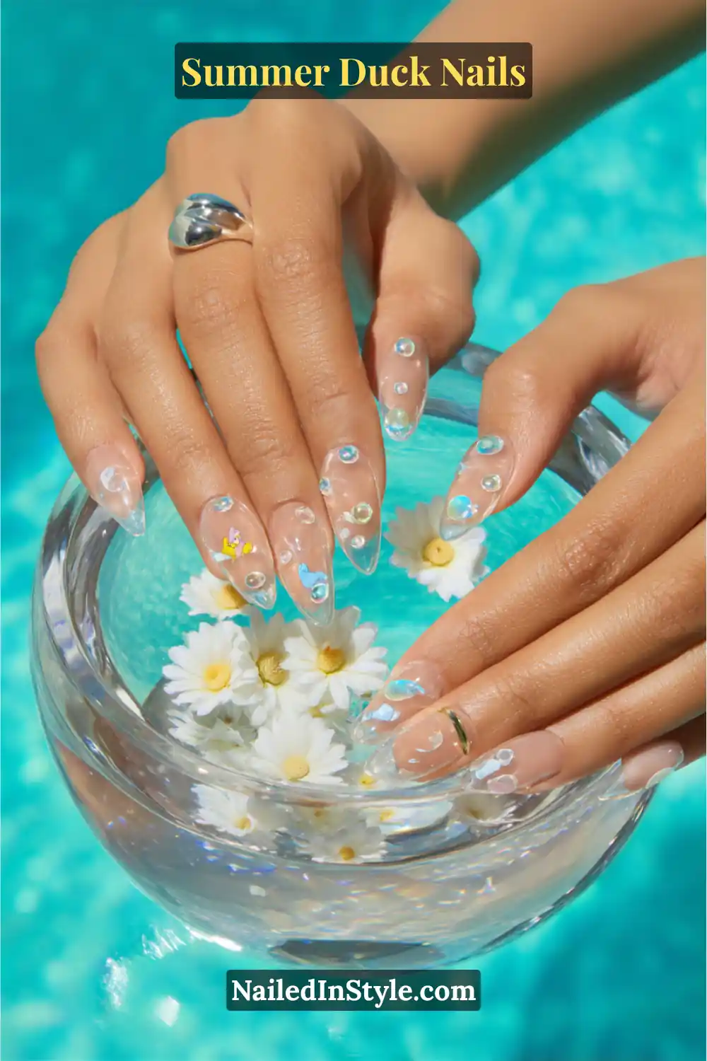 Cute Summer Duck Nails You’ll Want in 2026 14 Clear nails adorned with bubble-like gems and small duck accents.