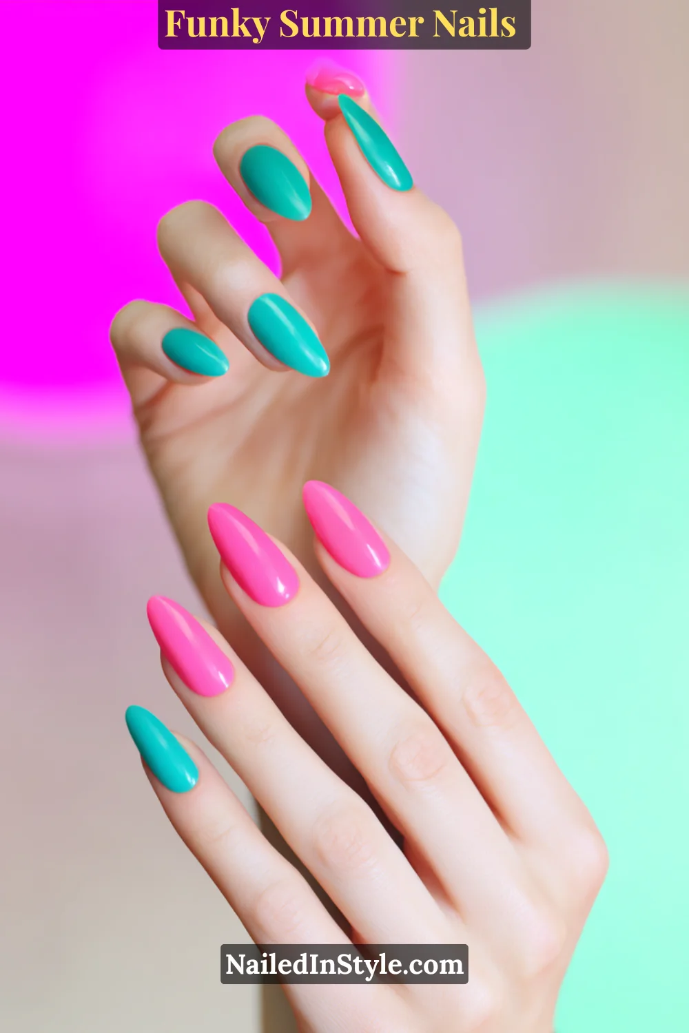 Close-up of almond-shaped nails on fair skin painted in alternating neon pink and aqua blue shades. The glossy finish creates a bold, fresh contrast perfect for summer.