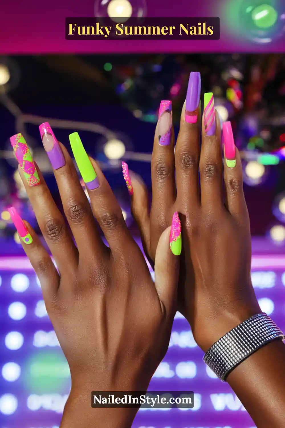 Close-up of long coffin-shaped nails with neon pink, lime green, and purple polish. Each nail has a unique design, featuring geometric blocks, swirls, glitter accents, and negative space details for a vibrant, festival-ready look.