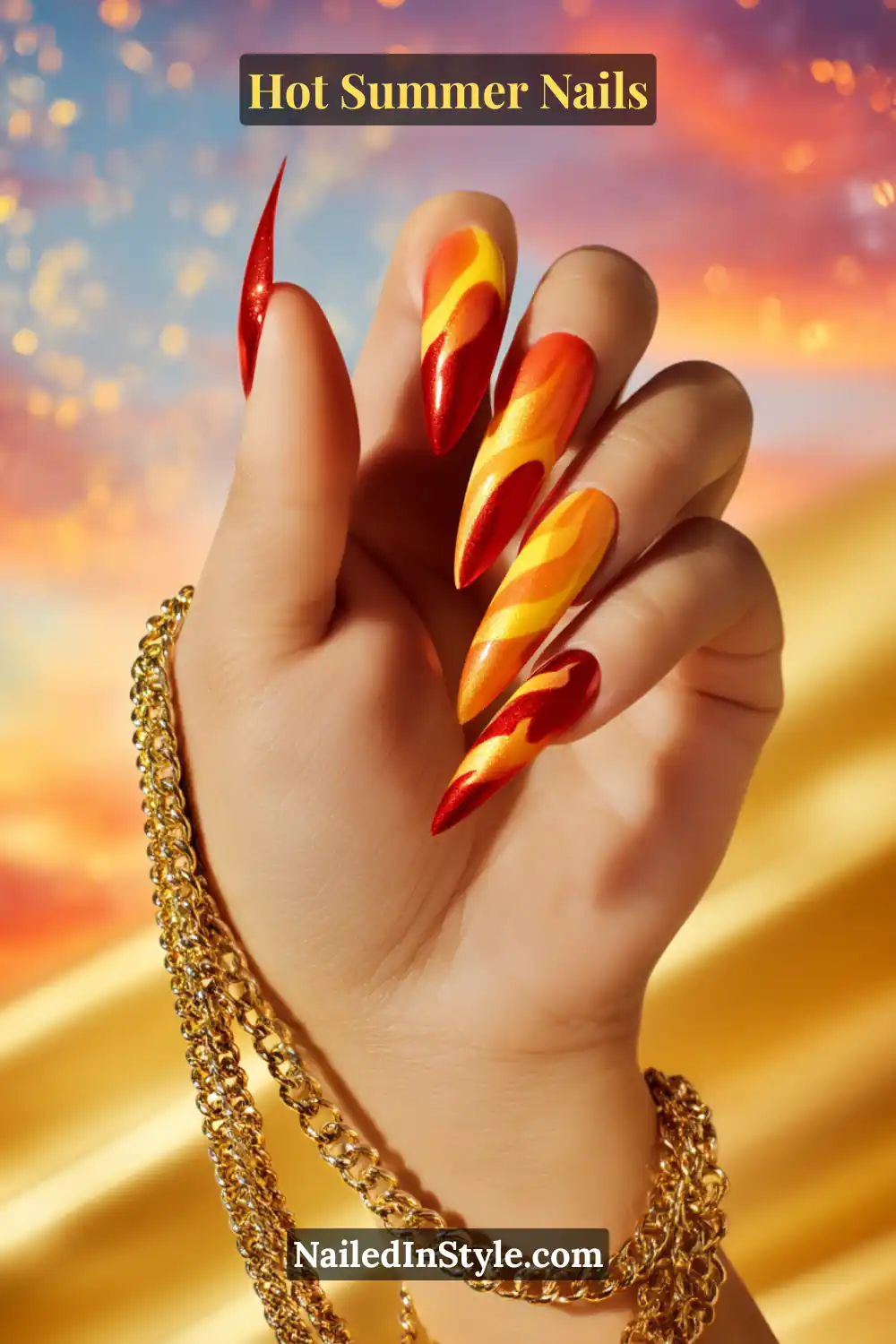 Hot Summer Nails 2025: Bold & Trendy Manicures 1 Close-up of long stiletto nails with bold flame nail art in shimmering red, orange, and yellow, creating a fiery hot summer manicure.