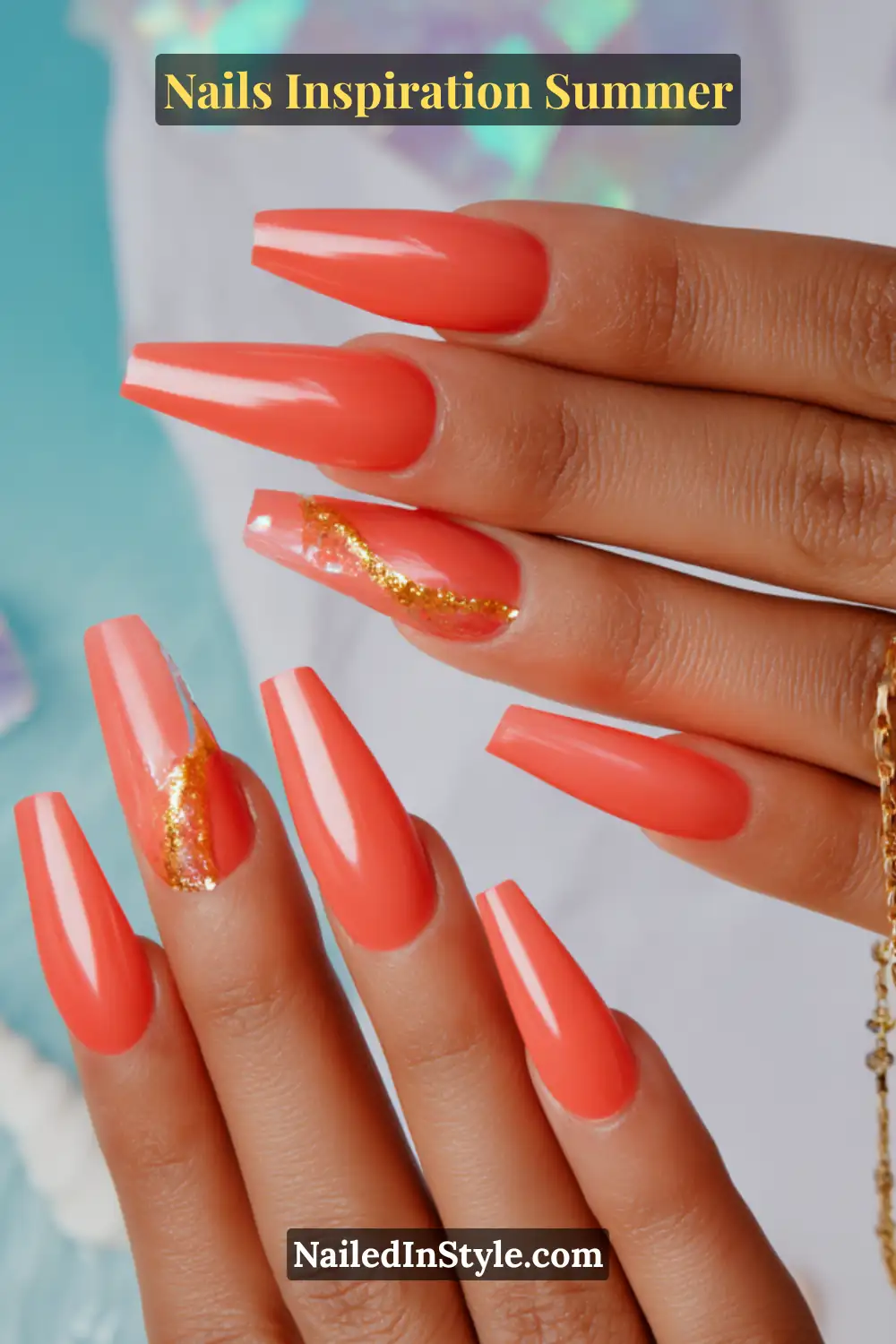 Nails Inspiration Summer 2025: Fresh Trends & Chic Ideas 9 Close-up of long coffin-shaped nails painted in vibrant coral with glossy finish, featuring accent nails with gold foil details, perfect for medium skin tones and summer inspiration.