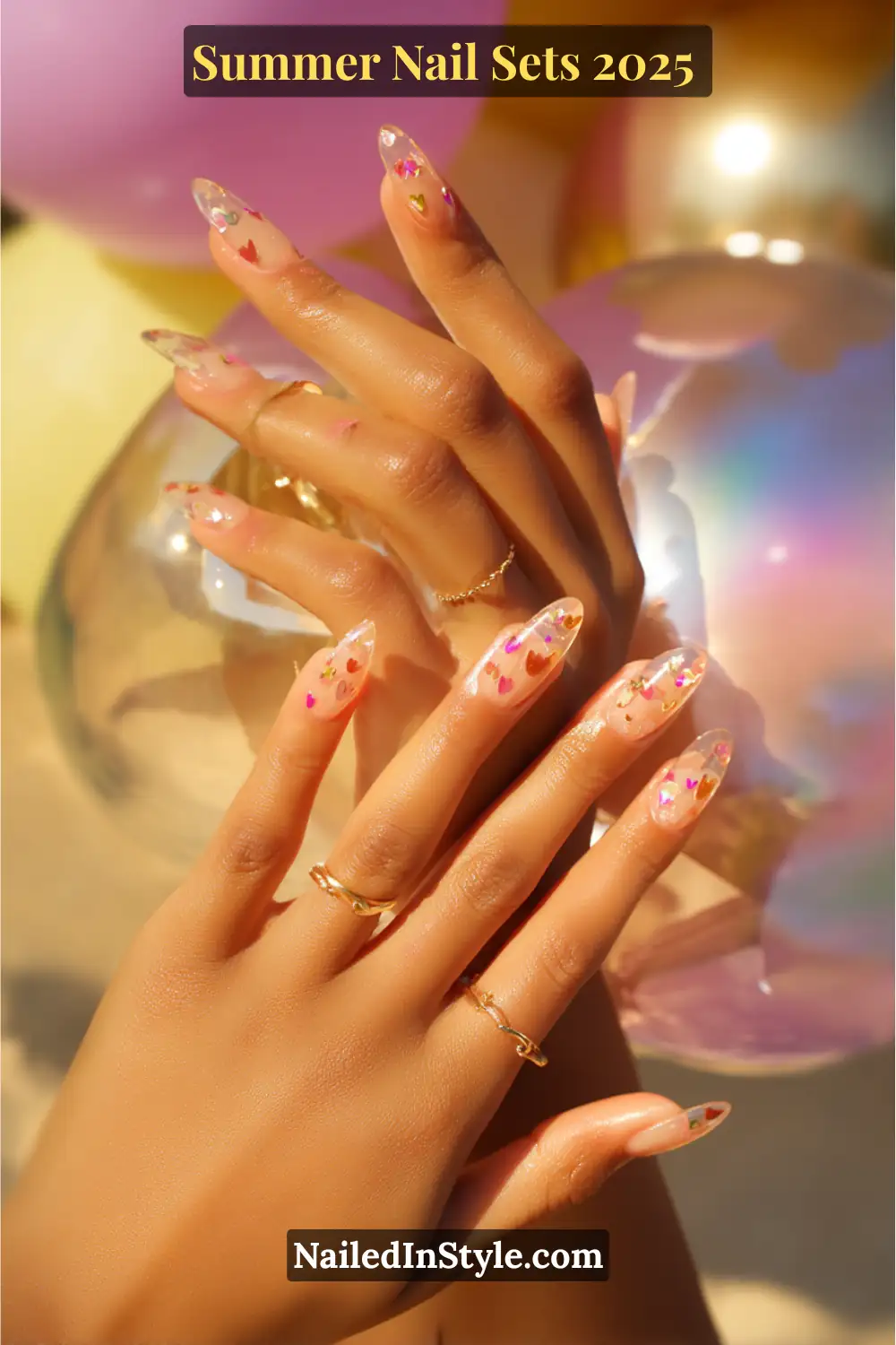 Stunning Summer Nail Sets You’ll Want This Season 19 Clear jelly almond nails with peach undertones and tiny iridescent heart charms for a playful summer look.