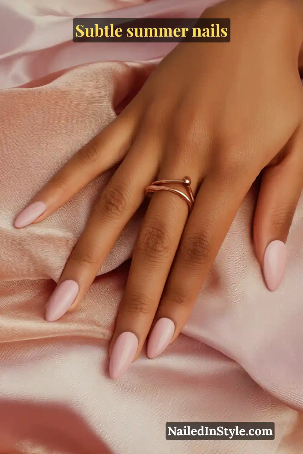 Almond-shaped nails in peach nude and soft lavender, designed to complement light skin tones with a warm yet subtle finish.