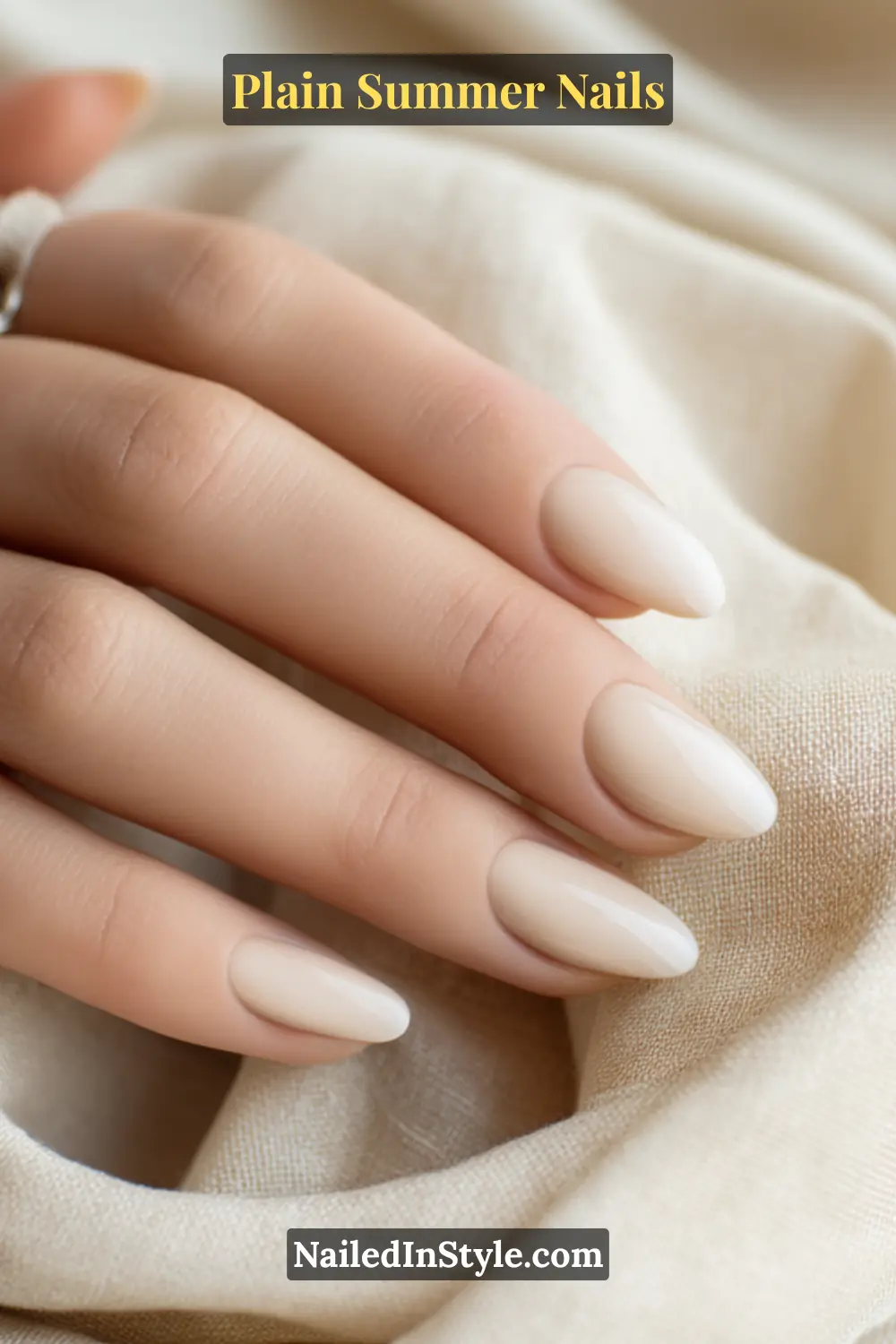 Plain Summer Nails 2025: Simple & Timeless Beauty 20 Elegant close-up of milky beige nails with a smooth glossy finish, a clean and versatile nude manicure for summer.