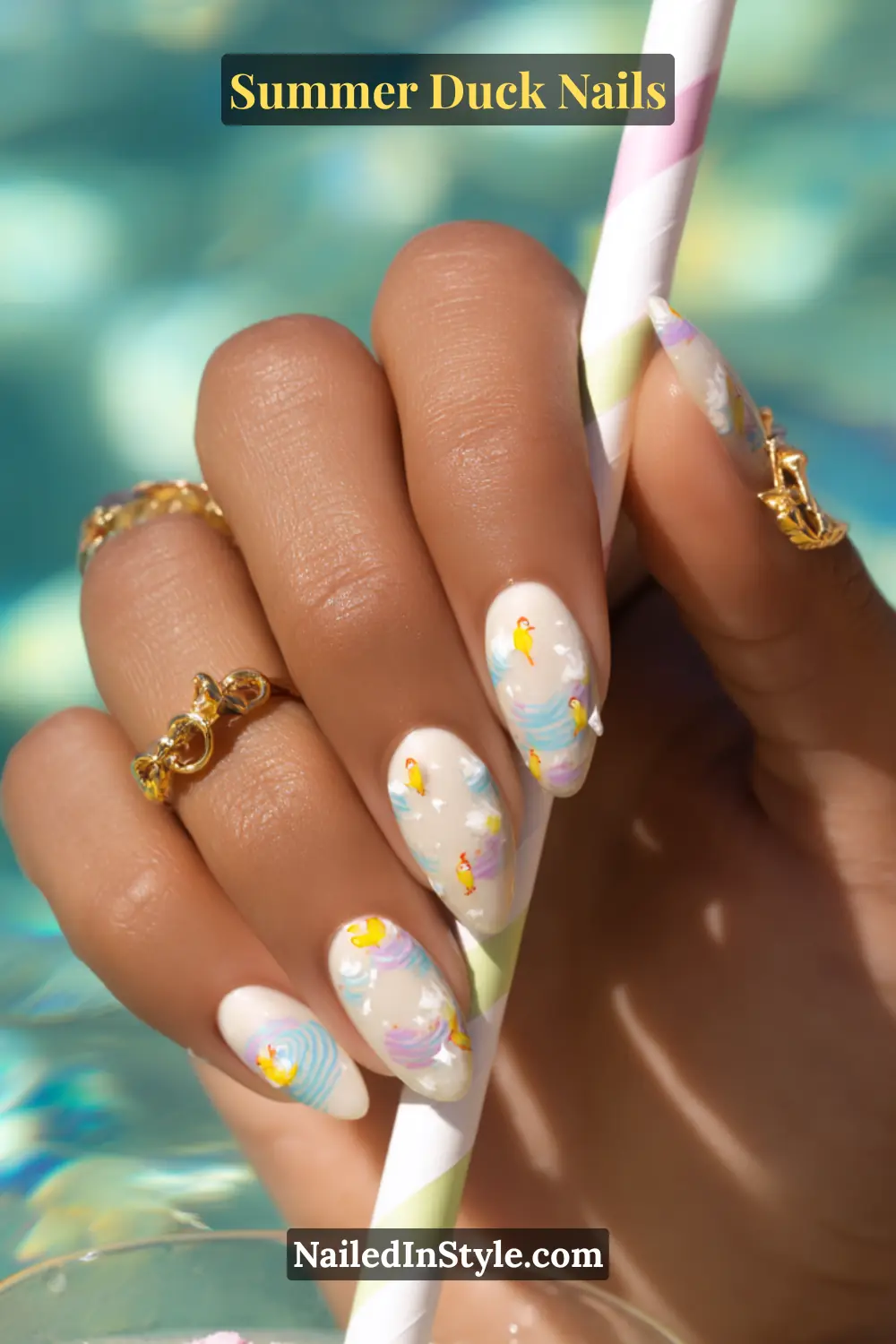 Cute Summer Duck Nails You’ll Want in 2026 21 White nails decorated with colorful waves and tiny, unique duck designs on each finger.