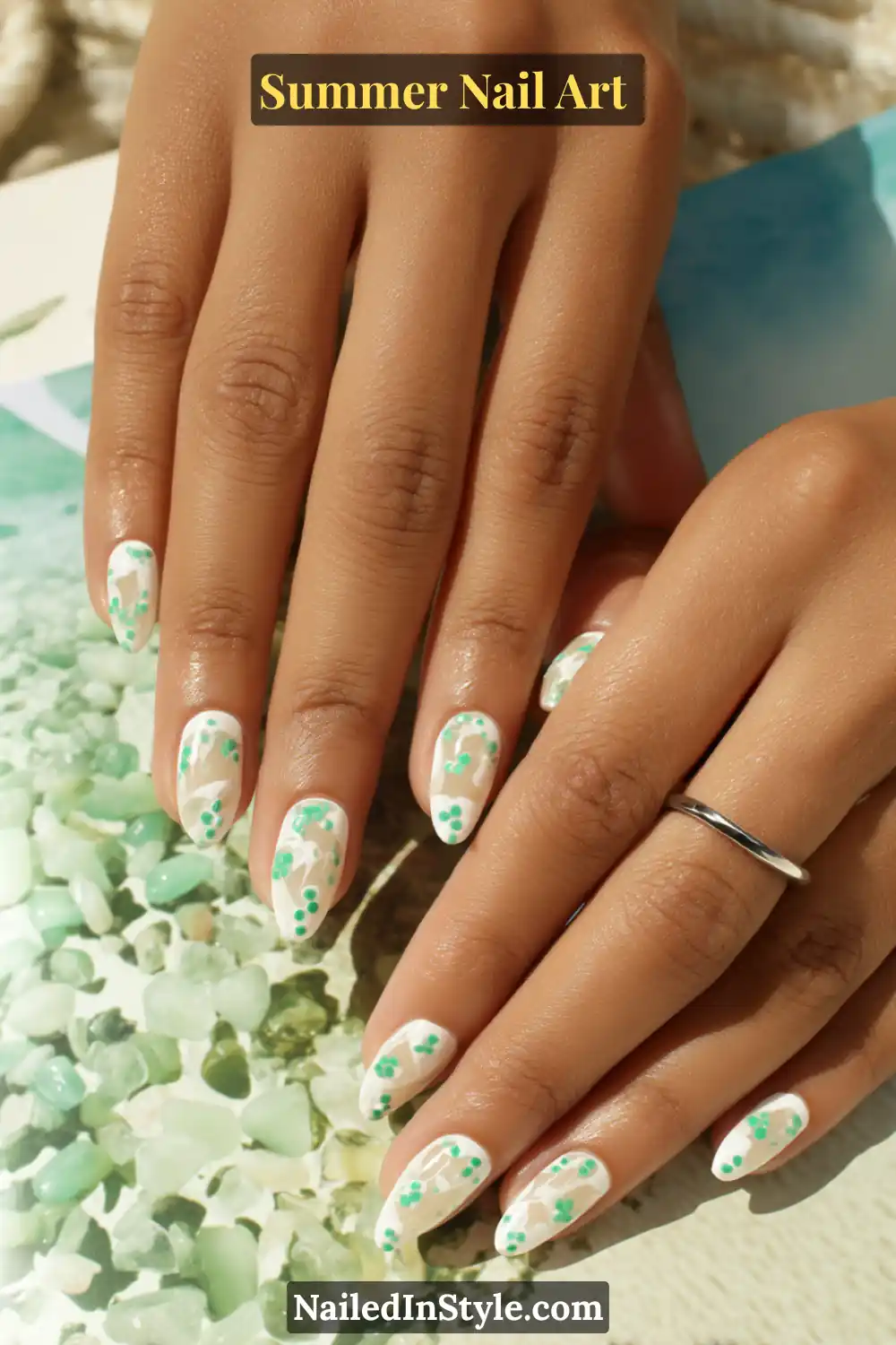 Gorgeous Summer Nail Art Ideas You’ll See Everywhere 16 Minimal summer nail art with a clean nude base, white tips, and scattered mint green dotted accents for a playful touch.