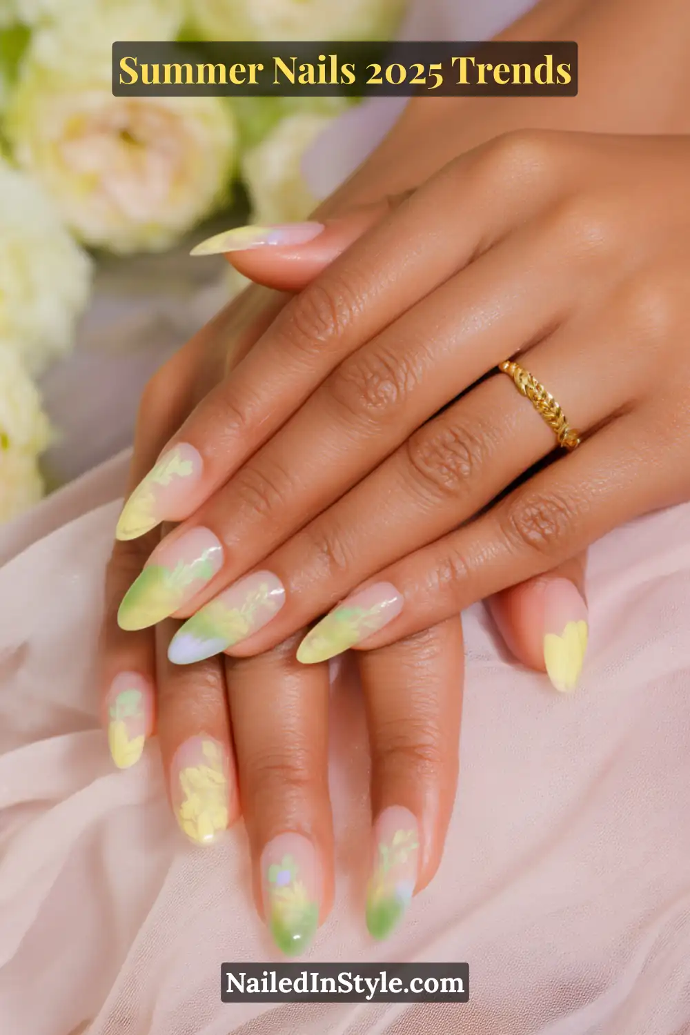 Almond nails with butter yellow and matcha green pastel aura floral design