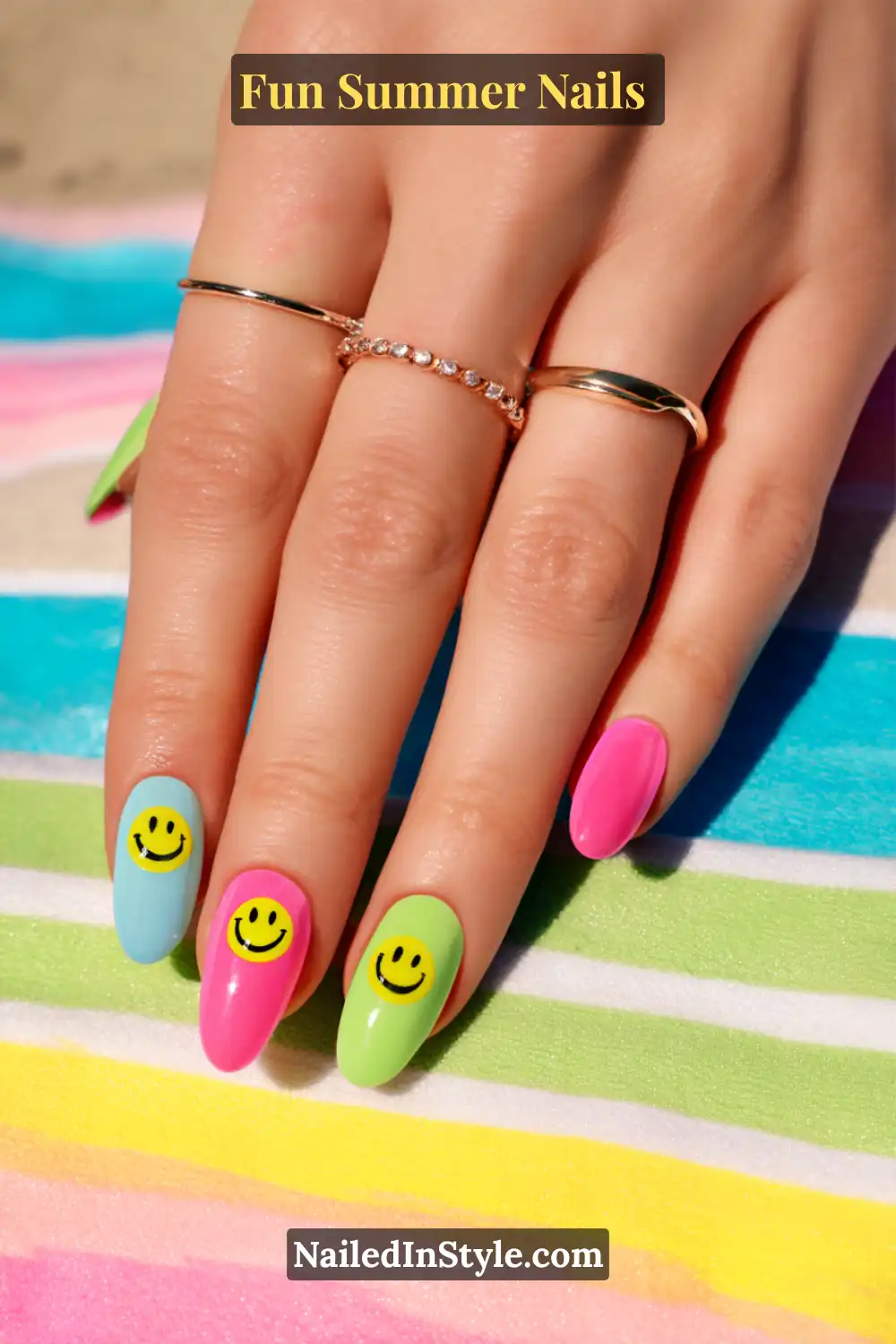 Fun Summer Nails Hands with funky pop art nails featuring comic-style accents, lightning bolts, polka dots, and bright color blocks in red, blue, yellow, and white.
