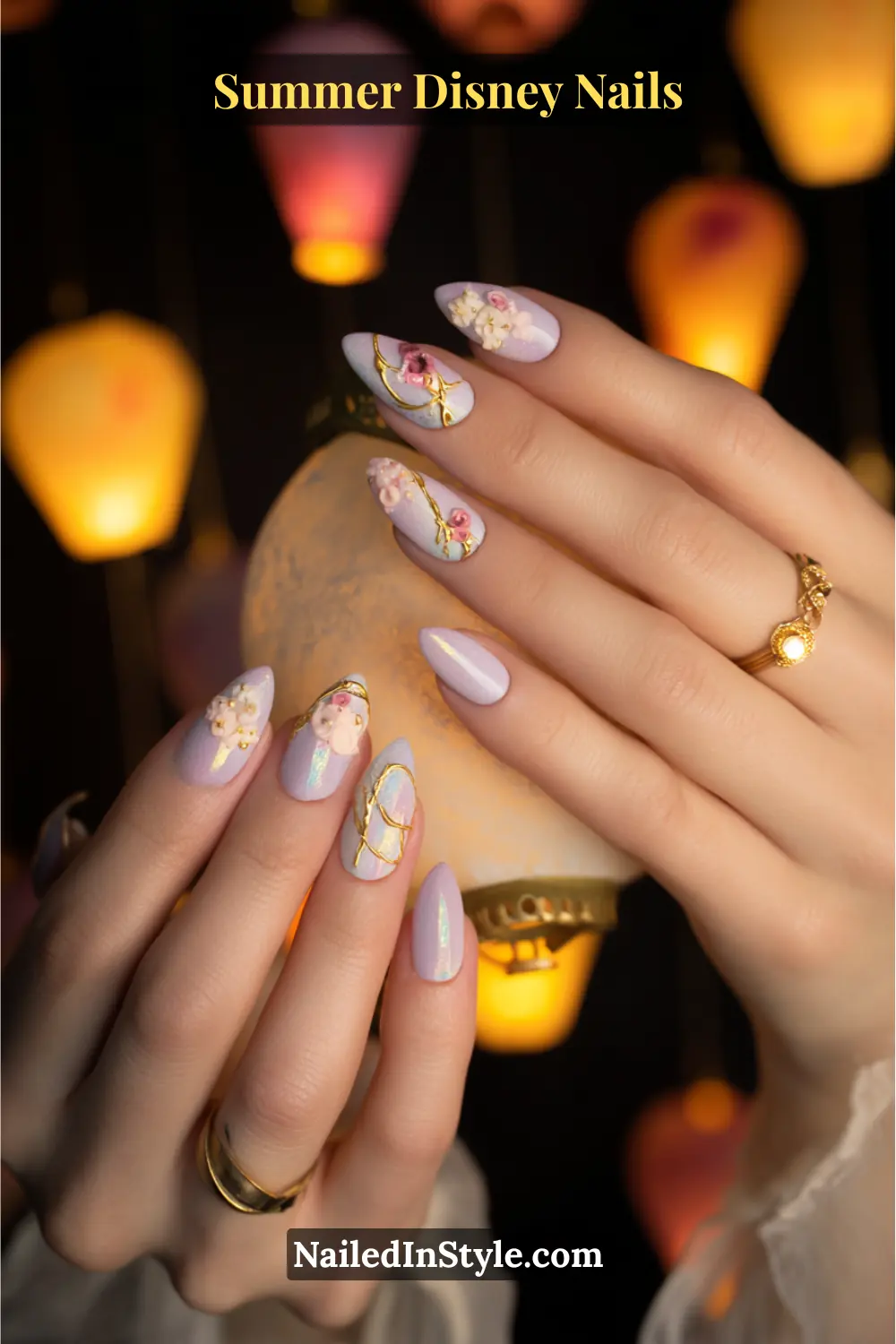 Long almond-shaped nails in lavender shimmer, adorned with golden braid patterns and 3D floral accents inspired by Tangled’s lantern scene.