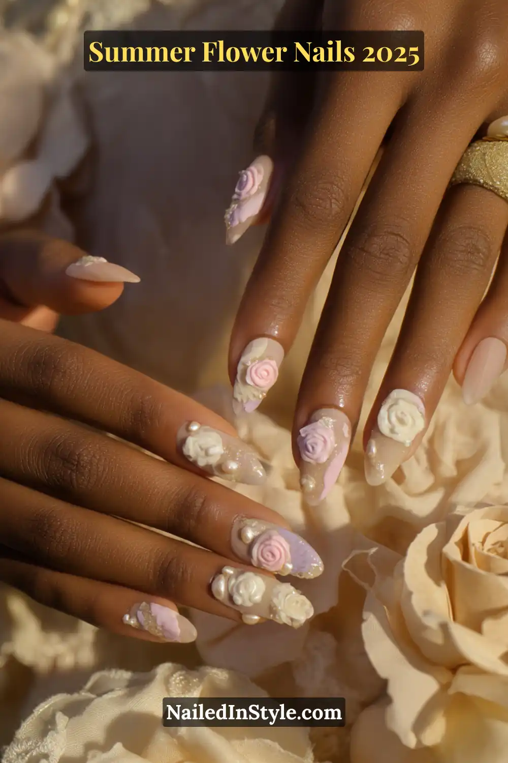 Nude almond nails with 3D sculpted rosebuds and pearl accents.