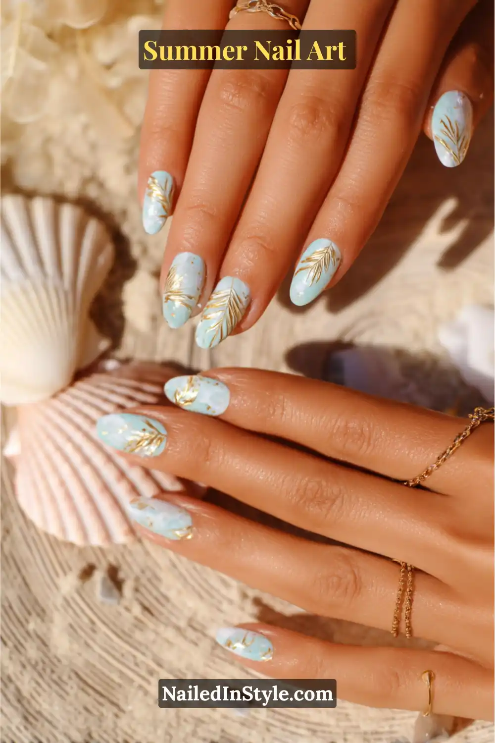 Gorgeous Summer Nail Art Ideas You’ll See Everywhere 12 Elegant summer nail art with a seafoam blue base, gold palm leaf accents, and subtle gold speckles, perfect for a beachy vibe.
