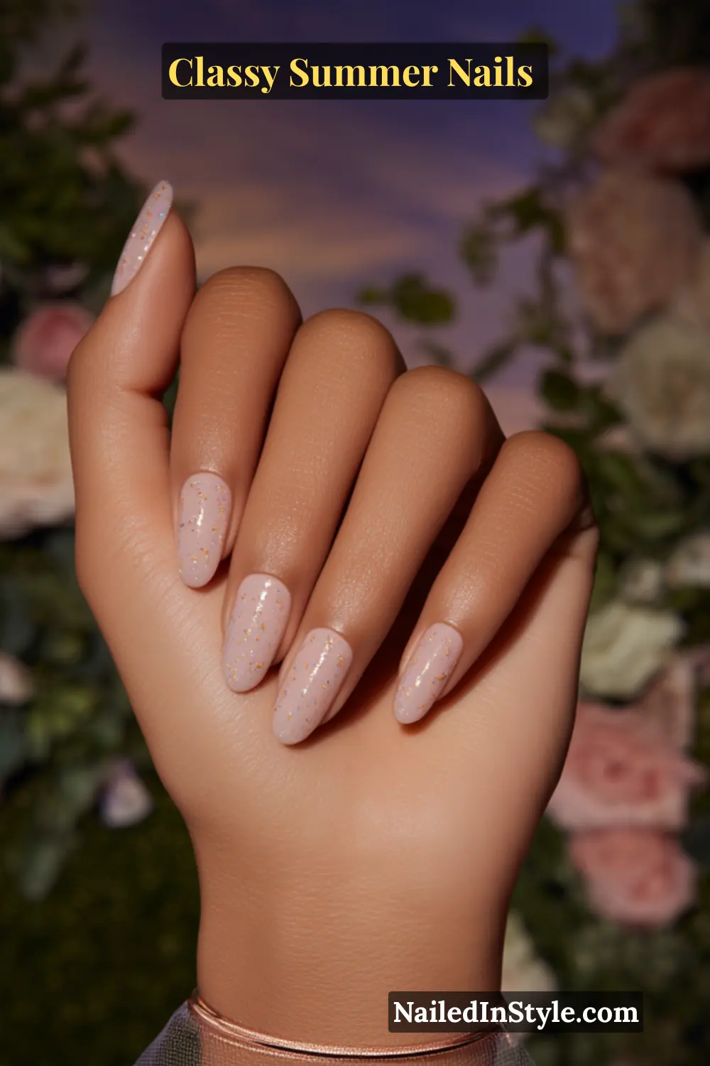 Classy Summer Nails 2026 Trends You’ll Love 5 Elegant blush pink nails with champagne tones and delicate gold micro-glitter accents, creating a soft and glamorous summer manicure.