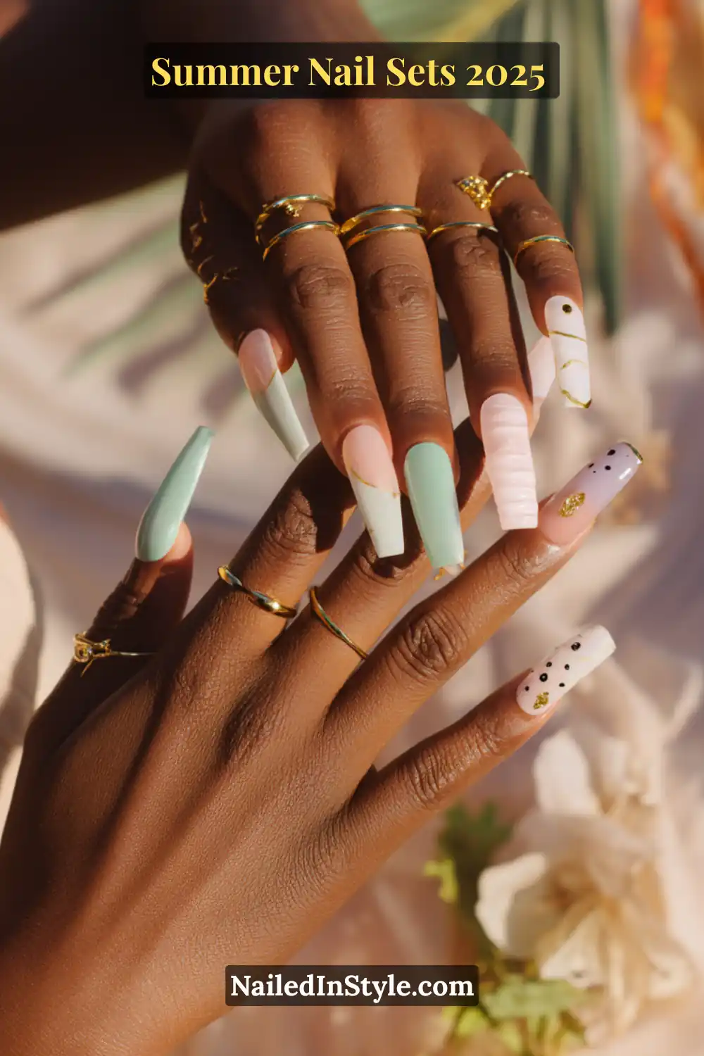 Stunning Summer Nail Sets You’ll Want This Season 1 Long coffin nails in pastel green, pink, and white with gold details and abstract patterns