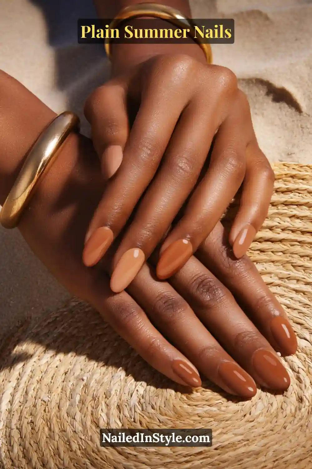 Plain Summer Nails 2025: Simple & Timeless Beauty 6 Close-up of elegant hands with almond-shaped nails painted in mocha, caramel, and bronze shades, finished with a high-gloss shine.