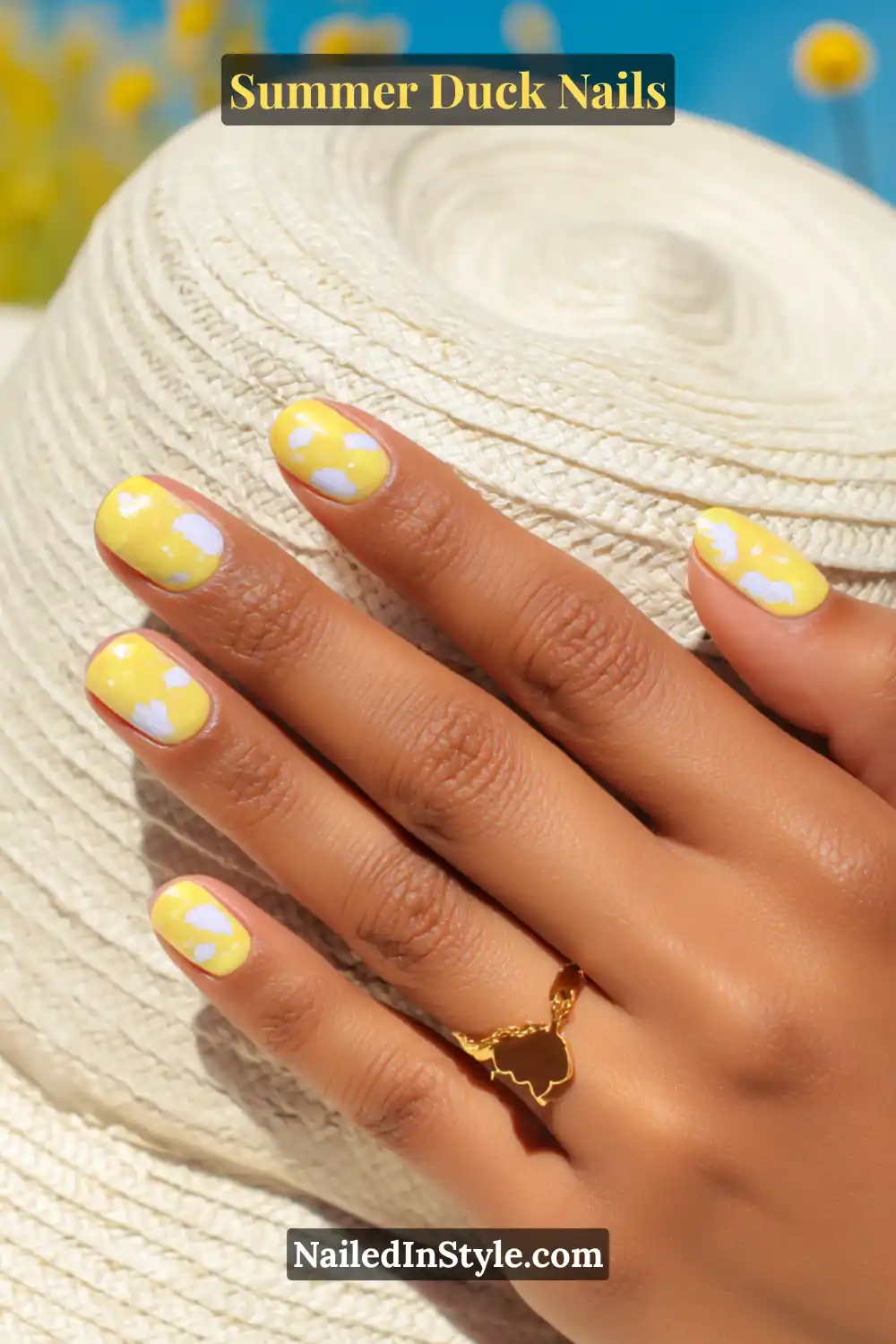 Cute Summer Duck Nails You’ll Want in 2026 15 Bright yellow nails decorated with small white clouds, inspired by sunny skies.