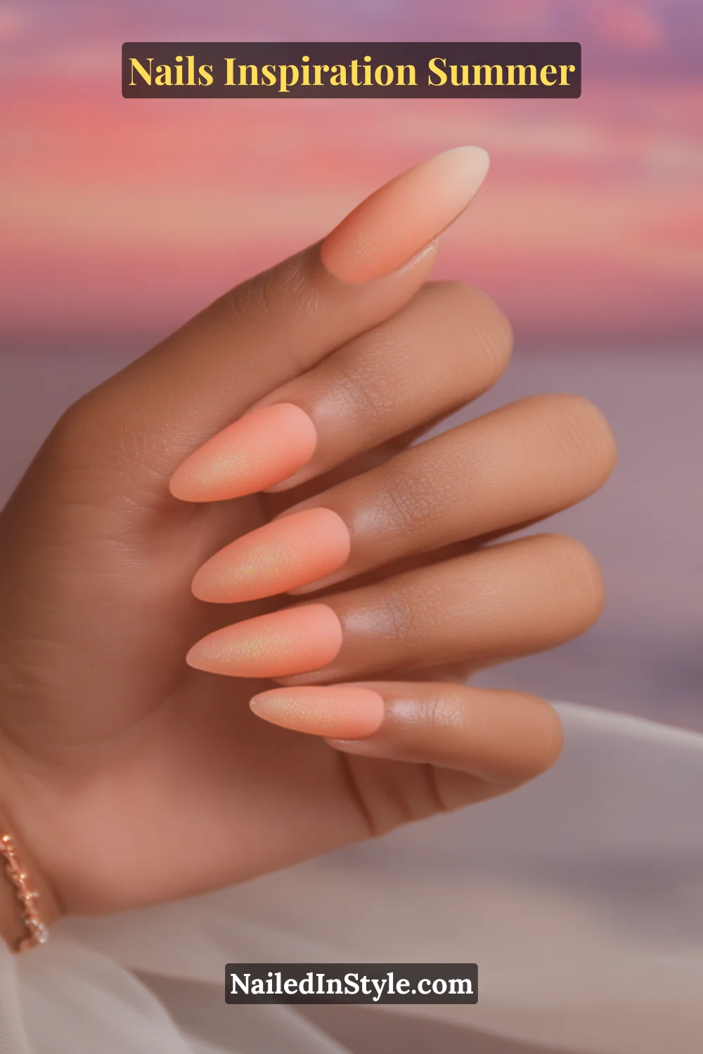 Nails Inspiration Summer 2025: Fresh Trends & Chic Ideas 6 Close-up of almond-shaped nails with coral, peach, and gold shimmer in a gradient ombré fade, inspired by summer sunsets.