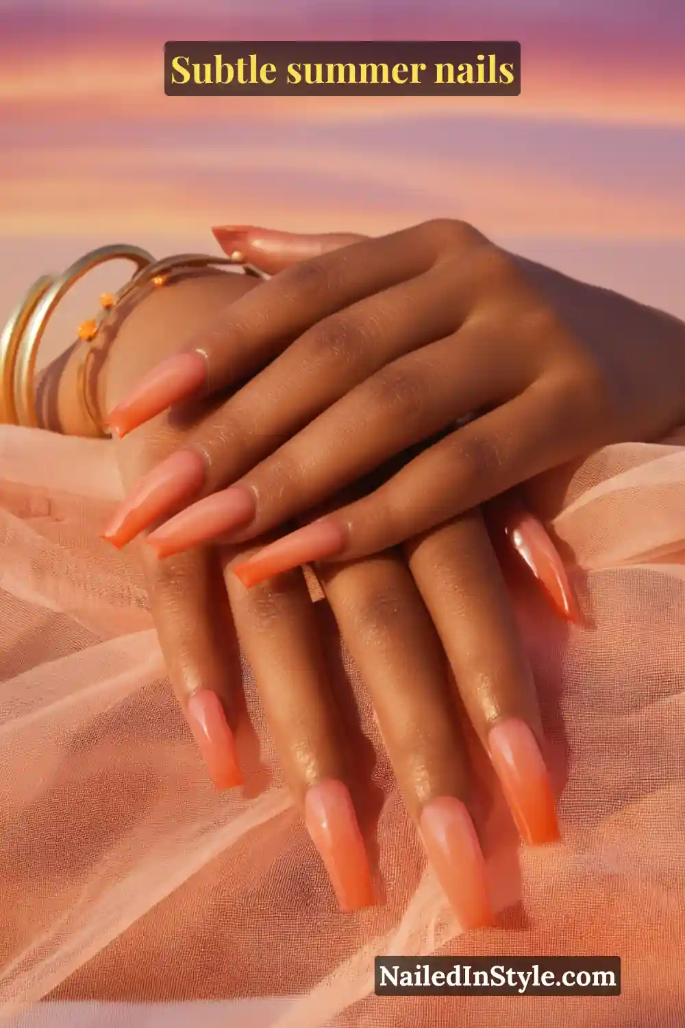 Long coffin-shaped nails in a soft gradient ombré, blending peach, coral, and sunset orange for a warm summer glow.