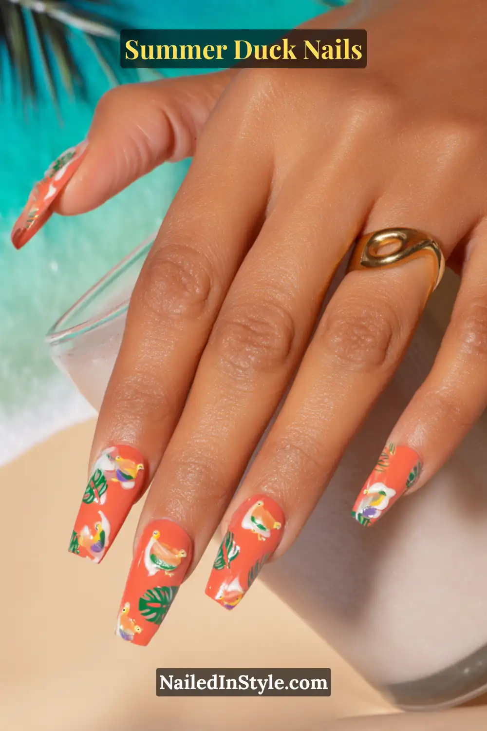 Cute Summer Duck Nails You’ll Want in 2026 17 Long square coral nails with painted ducks, green palm leaves, and tropical flower details.