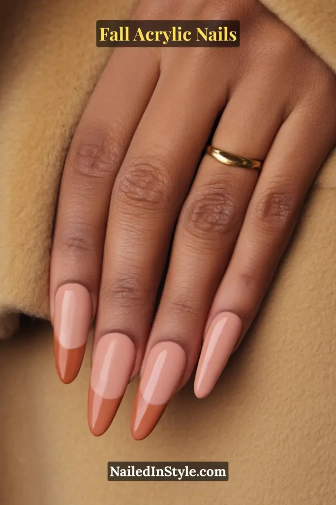 Almond acrylic nails with a strong cover pink apex and sculpted terracotta French tips.