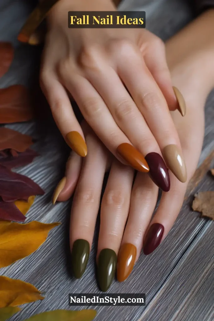 Fall Nail Ideas: 21 Gorgeous Looks to Try Now 20 Fall nails featuring a palette of creme finishes in earthy tones: mustard, caramel, burgundy, olive, and beige.