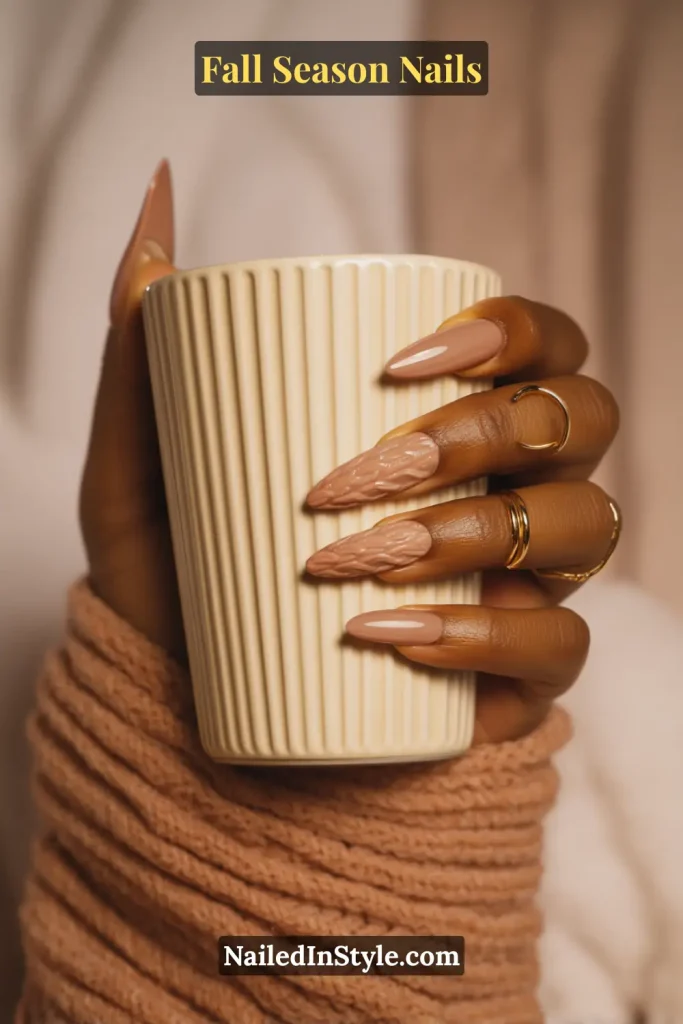 Fall Season Nails Caramel gel nails with cable-knit emboss accents, styled holding a ribbed mug.