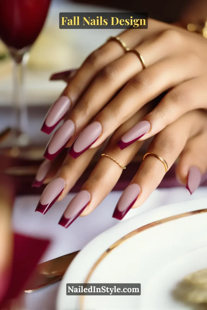 Fall Nails Design: Bold, Chic & Gorgeous Ideas 18 Fall nails design with nude base and berry tips in coffin shape, styled elegantly with dinner table cutlery.