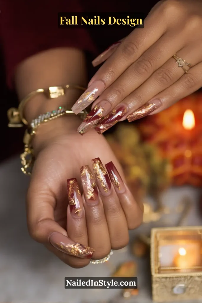 Fall Nails Design: Bold, Chic & Gorgeous Ideas 16 Fall nails design featuring nude nails with gold foil accents, styled beside jewelry and candlelight.