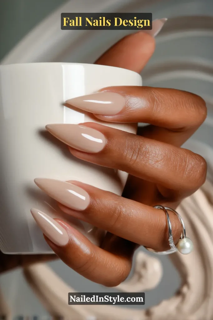 Fall Nails Design: Bold, Chic & Gorgeous Ideas 13 Fall nails design featuring latte jelly nails with a creamy sheer nude gloss, styled with a ceramic brunch plate.